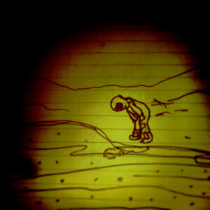 A hand-drawn figure in a spacesuit stands on uneven ground, looking down at an object, with mountains in the background.